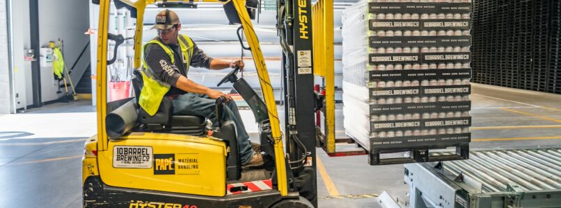 Man lifting pallets